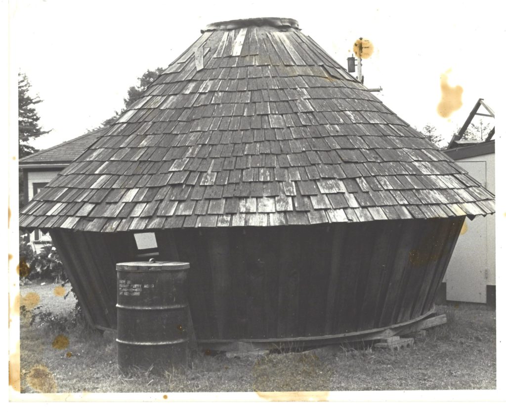 A black and white photo of the yurt pictured after original construction is completed.
